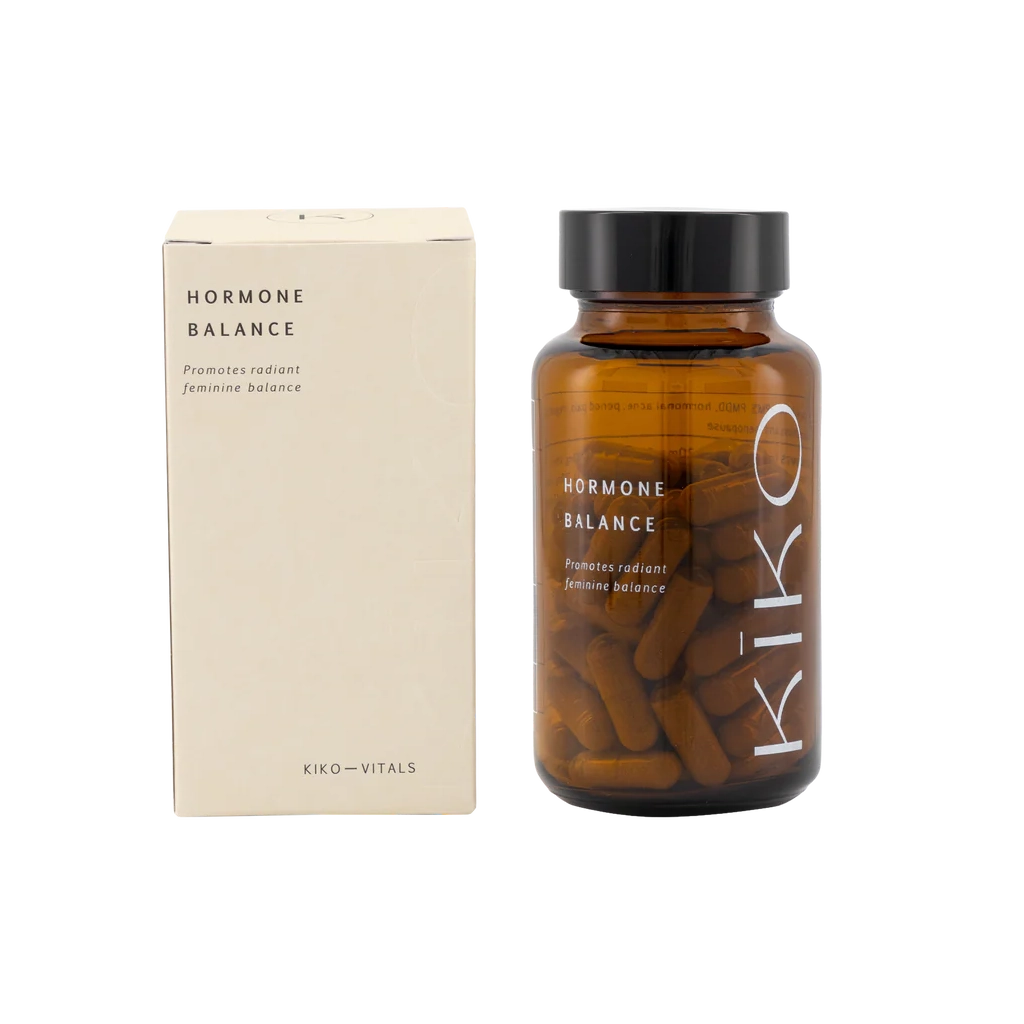 Brown supplement bottle with 'Kiko' branding and beige box labeled 'Hormone Balance' on a white background