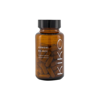 Brown supplement bottle labeled 'KIKO' with 'Hormone Balance' on a white background