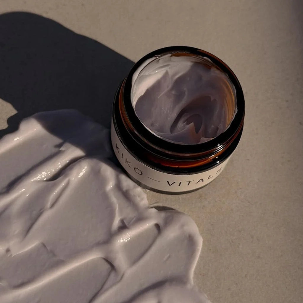 Kiko Vitals Sacred Moon Balm with cream on a textured surface