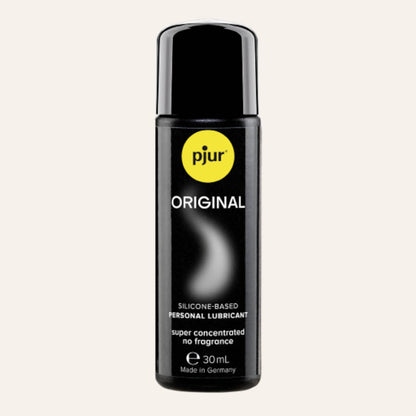 Black bottle of pjur Original silicone-based personal lubricant on a white background